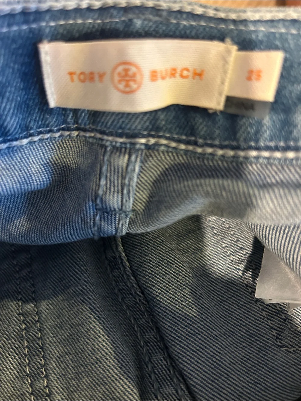 Tory Burch Light Blue Straight Leg Jeans with Gold Button and Ribbon Detail